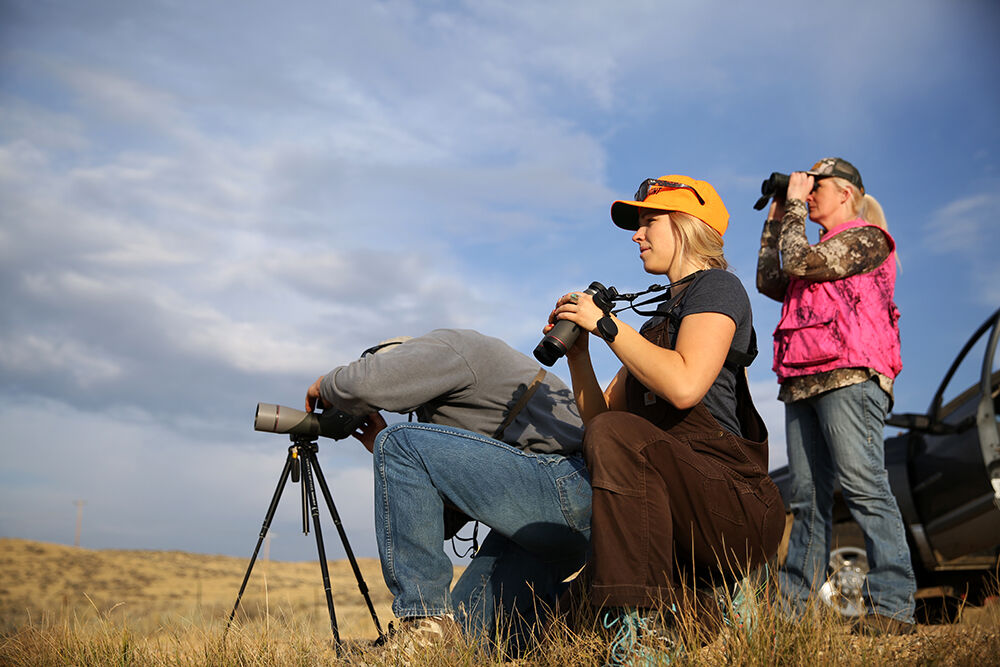 Guide Matt Bowers sets up a scope